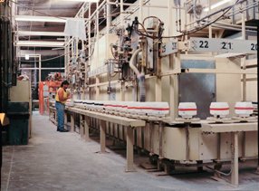 Clay mixture is poured into pre-formed molds.